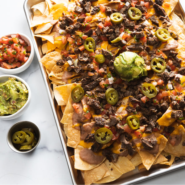 Making this EASY and DELICIOUS Cheesy Sheet Pan Fajita Nachos